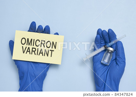 Doctor hand holds a card with text - New covid variant Omicron. Covid-19 new variant - Omicron. Omicron variant of coronavirus. SARS-CoV-2 variant of concern Doctor hand holds a card with text - New covid variant Omicron. Covid-19 new variant - Omicron. Omicron variant of coronavirus. SARS-CoV-2 variant of concern 84347824