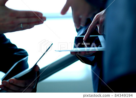 close up. two businessmen with tablet computers close up. two businessmen with tablet computers 84349194