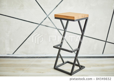 high bar stool made of wood and metal. high bar stool made of wood and metal. 84349832
