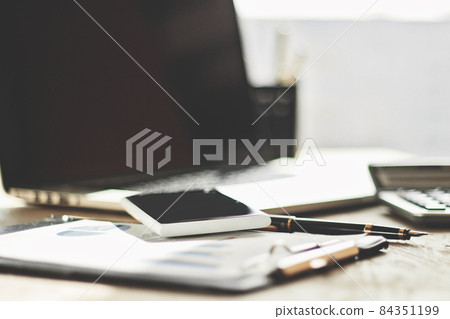 close up.the background image of the desktop in the office close up.the background image of the desktop in the office 84351199