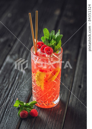 Different delicious cocktail on table in bar. alcoholic coctail and mix drink with ice and fruit, Space for text Different delicious cocktail on table in bar. alcoholic coctail and mix drink with ice and fruit, Space for text 84351324