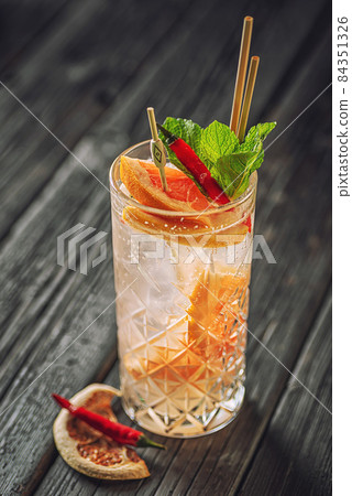 Different delicious cocktail on table in bar. alcoholic coctail and mix drink with ice and fruit, Space for text Different delicious cocktail on table in bar. alcoholic coctail and mix drink with ice and fruit, Space for text 84351326