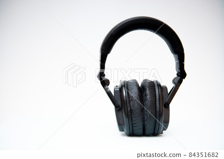 Black headphones on an isolated white background with copy space 84351682
