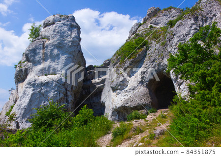Rock formation with cave at Podlesice, Poland Rock formation with cave at Podlesice, Poland 84351875