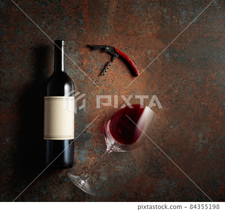 Red wine on an old rough background. 84355198