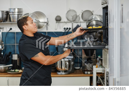 Professional Chef in Kitchen Side View 84356885