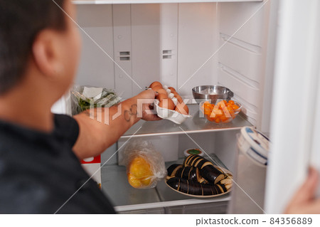 Fresh Eggs in Fridge 84356889