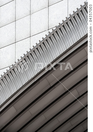 Ixelles, Brussels Capital Region, Belgium - 11 19 2021: Abstract of patterns and arched concrete structure of the European Parliament Ixelles, Brussels Capital Region, Belgium - 11 19 2021: Abstract of patterns and arched concrete structure of the European Parliament 84357003