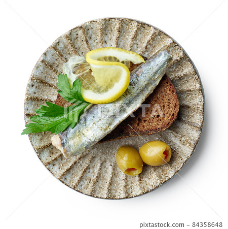 canned sardine on bread slice canned sardine on bread slice 84358648