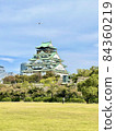 Osaka Castle castle tower and airplane 84360219