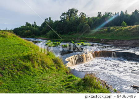 The coast of a small river, large stones. The coast of a small river, large stones. 84360499