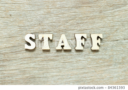 Alphabet letter in word staff on wood background Alphabet letter in word staff on wood background 84361393