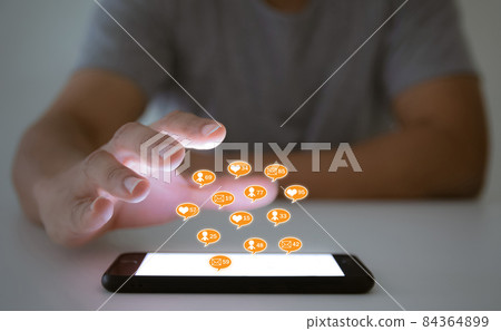 Human hand, communication technology in a smartphone 84364899