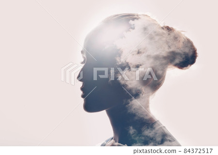 Psychology concept. Sunrise and woman silhouette head 84372517