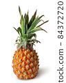 Single pineapple stands isolated on a white 84372720