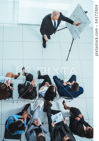 group of business people at a presentation in the conference room 84372984