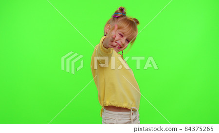 Stylish kid girl making trendy dance video for social media network, child dancing, funny blogger Stylish kid girl making trendy dance video for social media network, child dancing, funny blogger 84375265