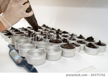 filling molds with hand-made natural organic cosmetics filling molds with hand-made natural organic cosmetics 84375702