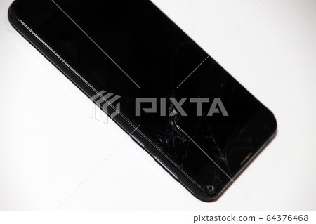 Screen of broken smartphone 84376468