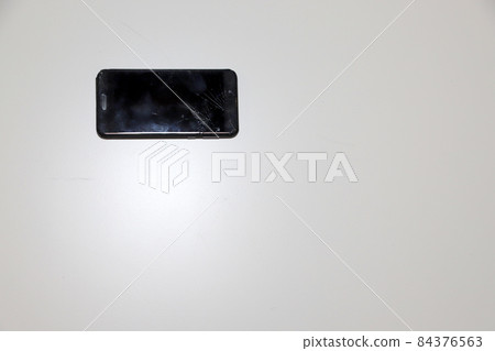 Screen of broken smartphone Screen of broken smartphone 84376563