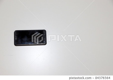 Screen of broken smartphone Screen of broken smartphone 84376564