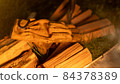 Gloves placed on firewood 84378389