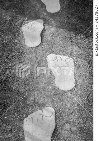 Close up of giant stone footprint. Image of yetti foot print Close up of giant stone footprint. Image of yetti foot print 84378627