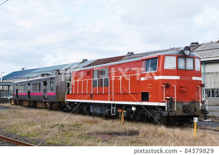DD14 type diesel locomotive that stops at the depot DD14 type diesel locomotive that stops at the depot 84379829