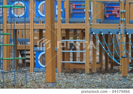 Modern play ground for children in the Moscow yard in autumn day. Place for leisure time during coronavirus pandemic. 84379866