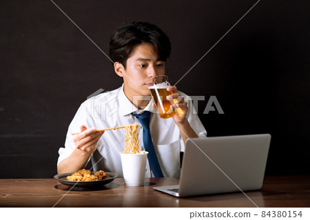Businessman midnight snack cup ramen 84380154