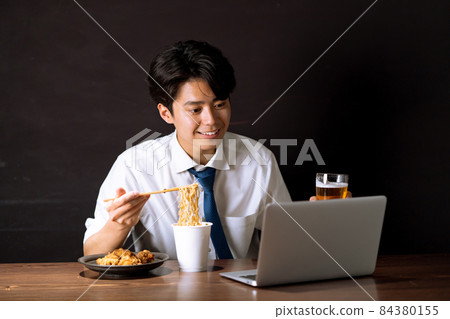 Businessman midnight snack cup ramen Businessman midnight snack cup ramen 84380155
