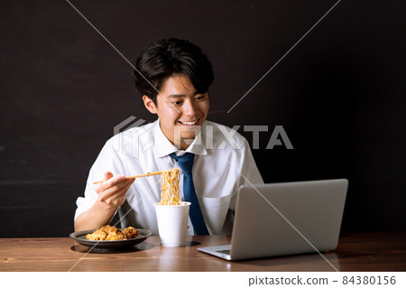 Businessman midnight snack cup ramen 84380156