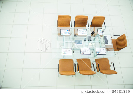chairs and Desk with documents and laptop for negotiations with business partners chairs and Desk with documents and laptop for negotiations with business partners 84381559