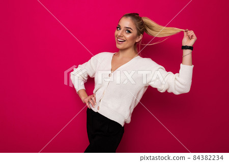 Photo of a beautiful pretty amazing positive smiling happy young blonde woman with makeup and Photo of a beautiful pretty amazing positive smiling happy young blonde woman with makeup and 84382234