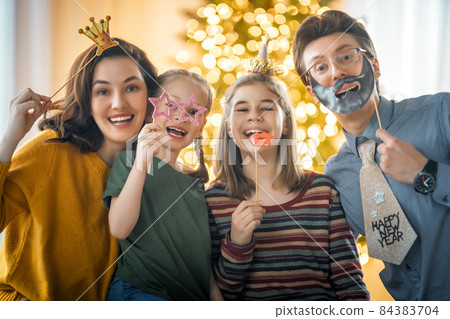 family celebrating New Year 84383704
