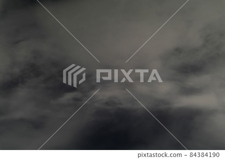 Scenic dark cumulus clouds before a storm 84384190