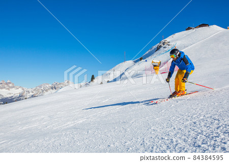 Alpine skier on slope at Cortina 84384595