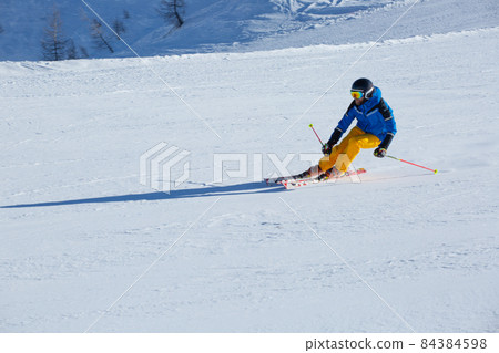 Alpine skier on slope at Cortina 84384598