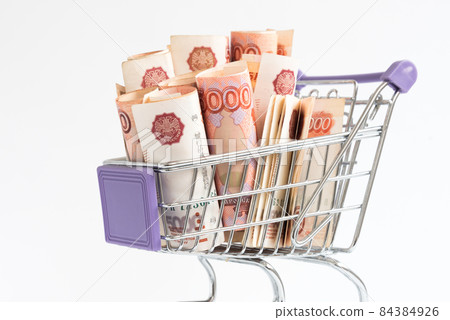 There are bills in the shopping basket. Russian ruble. Russian five thousandth bills. Concept. Maximum denomination There are bills in the shopping basket. Russian ruble. Russian five thousandth bills. Concept. Maximum denomination 84384926