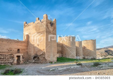 Almeria, Spain. Walls and towers of medieval defensive wall 84385003