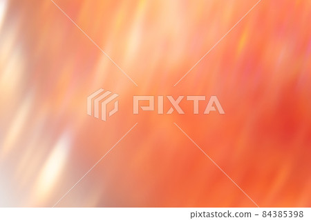 Defocused glow background. Bokeh rays. Lens flare filter. Sun shine leak. Blur pastel red pink orange flecks on bright abstract overlay. 84385398