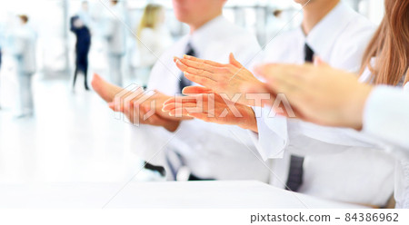 Close-up of business people clapping hands. Business seminar concept Close-up of business people clapping hands. Business seminar concept 84386962