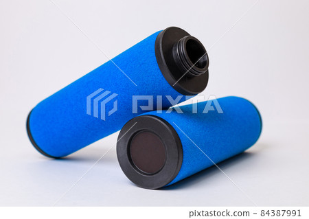 Air filters for a compressor with foam rubber, on a white backgroun 84387991