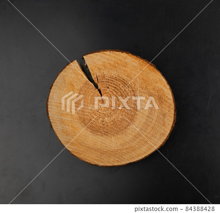 Wooden stump, cross section, cut wood tree trunk slice 84388428