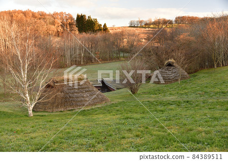 Photographing the scenery of the World Heritage Kitakogane Shell Mound in Date City, Hokkaido in late autumn 84389511