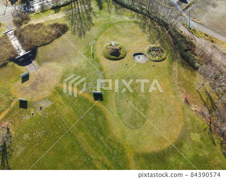Aerial view of the world heritage Irie shell mound in Toyako, Hokkaido in late autumn Aerial view of the world heritage Irie shell mound in Toyako, Hokkaido in late autumn 84390574