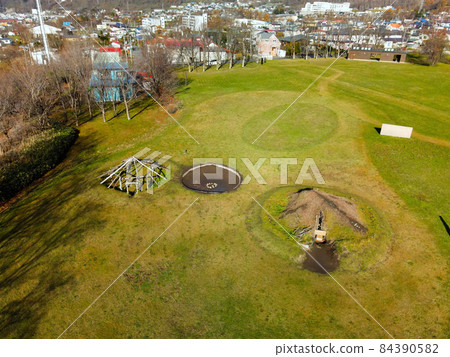 Aerial view of the world heritage Irie shell mound in Toyako, Hokkaido in late autumn Aerial view of the world heritage Irie shell mound in Toyako, Hokkaido in late autumn 84390582