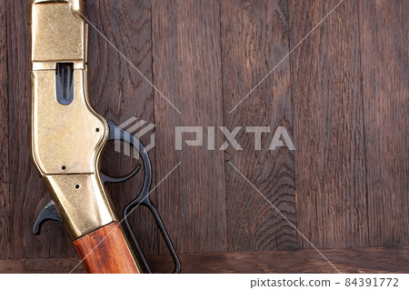 Old west gun - lever-action repeating rifle 84391772