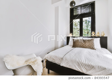 Small cozy bedroom with contrast on black 84393547