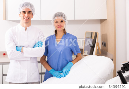 Two doctors in clinic of aesthetic medicine 84394291